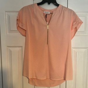 New with tag. Beautiful Calvin Klein salmon color blouse.
